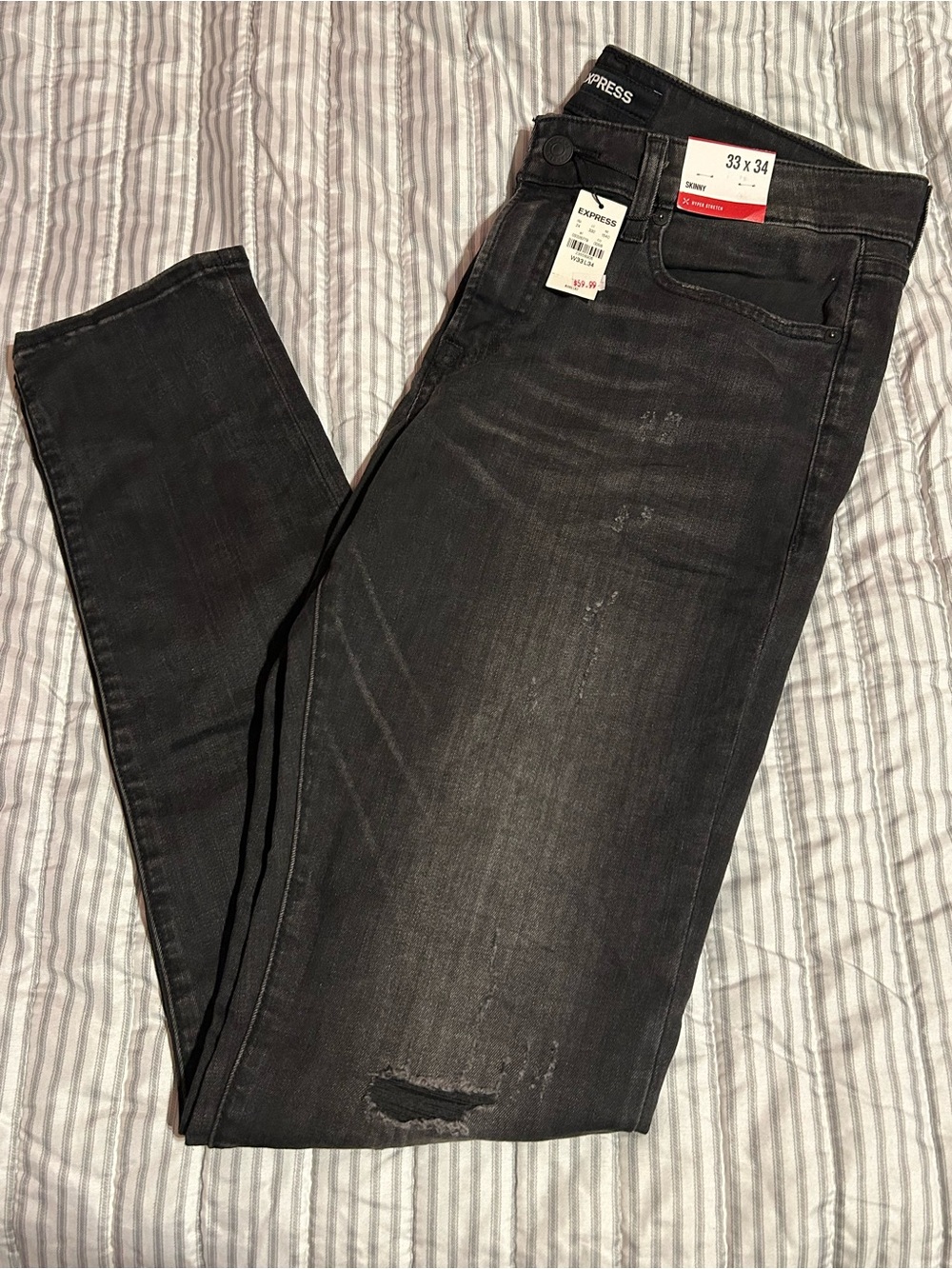 Express Men’s Black Slim Jeans with Subtle Distressing